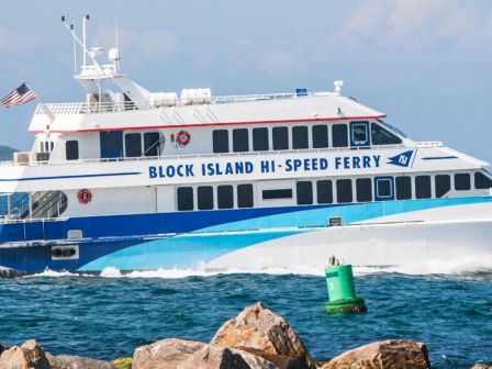 A high-speed ferry labeled 