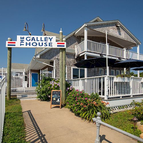 A pathway leads to a two-story building, 