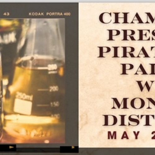 The image features a glass with a skull design, a bottle of rum, and text promoting a 